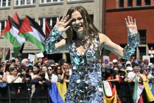 epa12090793 Norwegian singer-songwriter Emmy representing Ireland poses on the turquoise carpet during the opening ceremony of the 69th Eurovision Song Contest in Basel, Switzerland, 11 May 2025. The 69th edition of the song contest takes place in Basel with its semi-finals scheduled for 13 and 15 May, and a final on 17 May 2025.  EPA/PETER SCHNEIDER