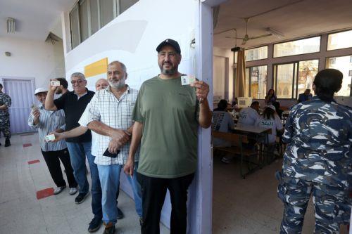 epa12129979 Lebanese voters line up to vote during the Municipality elections at a polling station in the southern port city of Sidon, Lebanon, 24 May 2025. The final phase of the Lebanese municipal elections is being held on 24 May after they were postponed in 2023 due to the financial and economic crisis the country is going through, and the lack of...