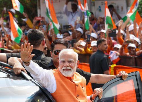 epa12136244 A handout photo made available by the press information bureau shows Indian Prime Minister Narendra Modi attending a rally in Vadodara, Gujarat, India, 26 May 2025. Modi is on a two-day visit to lay the foundation for several developmental projects to his home state, Gujarat. It is his first visit to the state following Operation Sindoor against...