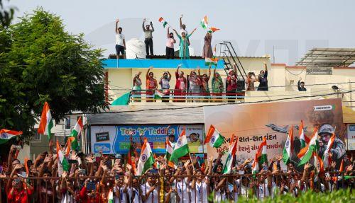epa12136246 A handout photo made available by the press information bureau shows people cheering as Indian Prime Minister Narendra Modi visits in Vadodara, Gujarat, India, 26 May 2025. Modi is on a two-day visit to lay the foundation for several developmental projects to his home state, Gujarat. It is his first visit to the state following Operation Sindoor...