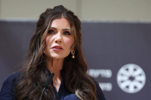 epa12136283 US Secretary of Homeland Security Kristi Noem attends a memorial ceremony for two Israeli embassy staffers killed in Washington, at the Foreign Ministry in Jerusalem, 26 May 2025. The couple was shot dead outside the Jewish museum in Washington, D.C, on 21 May by a man who was later arrested and charged with first degree murder.  EPA/ABIR SULTAN