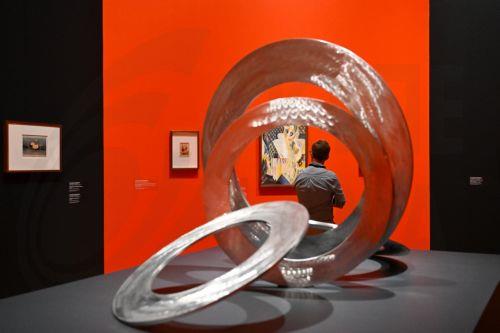 epa12142322 An attendee views artworks during 'Cezanne to Giacometti' major exhibition exclusive preview at National Gallery of Australia National Gallery of Australia in Canberra, Australia, 29 May 2025.  EPA/Lukas Coch AUSTRALIA AND NEW ZEALAND OUT