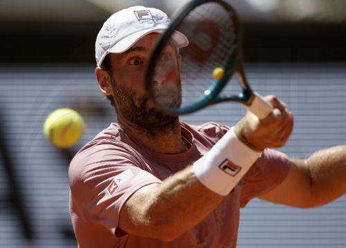 epa12144938 Quentin Halys of France in action during his Men's Singles 3rd round match against Holger Rune of Denmark at the French Open Grand Slam tennis tournament at Roland Garros in Paris, France, 30 May 2025.  EPA/YOAN VALAT