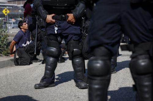 epaselect epa12169432 A protestor is detained during protests sparked by immigration raids in Los Angeles, California, USA, 10 June 2025. US President Donald Trump has deployed 2,000 National Guard troops, despite not receiving a request from the state of California for any additional assistance, following large protests against ongoing immigration...