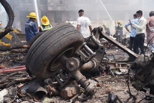 epaselect epa12171335 Debris at the site of a plane crash near Sardar Vallabhbhai Patel International Airport in Ahmedabad, Gujarat, western India, 12 June 2025. Air India flight AI171, bound for London carrying 242 passengers and crew members on board a Boeing 787-8 aircraft, crashed minutes after take-off in the Meghaninagar area of Ahmedabad. ...