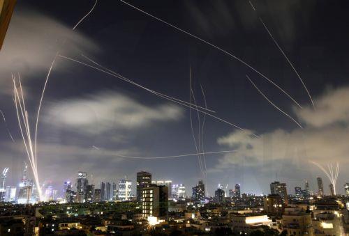 epa12182449 The Iron Dome, the Israeli air defense system, intercepts missiles fired from Iran, over Tel Aviv, Israel, 17 June 2025. Israel and Iran have been exchanging fire since Israel attacked Iran on 13 June 2025 as part of operation 'Rising Lion'.  EPA/ABIR SULTAN