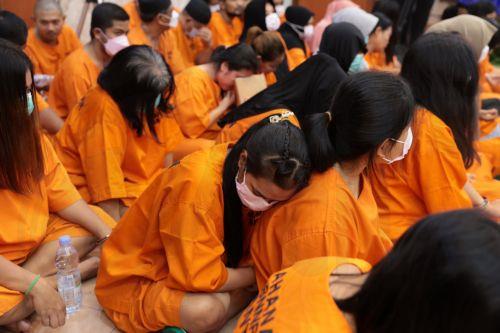 epa12192122 Alleged drug dealers sit as one covers her face during a press conference on the disclosure of a drug distribution network at the Directorate General of Customs and Excise office in Jakarta, Indonesia, 23 June 2025. The Indonesian National Narcotic Agency, together with Indonesian Customs, have succeeded in arresting 285 drug suspects with...