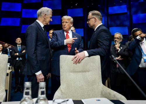 epa12196362 (L-R) Norway's Prime Minister Jonas Gahr Store, US President Donald J. Trump, and Polish President Andrzej Duda talk at the beginning of the NATO Summit at the World Forum in The Hague, The Netherlands, 25 June 2025. The Netherlands, for the first time in NATO's history of existence, is hosting a NATO summit.  EPA/REMKO DE WAAL