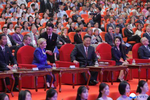 epa12205624 A photo released by the official North Korean Central News Agency (KCNA) shows Russian Culture Minister Olga Lyubimova (2nd row 2-L), North Korean leader Kim Jong Un (2nd row C) and his daughter Kim Ju Ae (2nd row 2-R) attending a perfomance in Pyongyang, North Korea, 29 June 2025 (issued 30 June 2025). According to KCNA, Lyubimova is visiting...