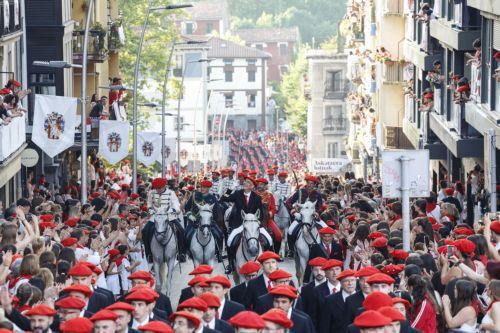 epa12205822 Participants attend the traditional 'Alarde' parade during festivities in the town of Irun, Basque Country, northern Spain, 30 June 2025. The parade commemorates the victory of Irun's troops over French invaders on 30 June 1522. Each year, residents dressed as members of the infantry, lumberjacks, sappers, and a military band take part in the...