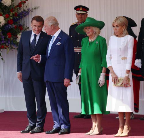 epa12224358 (L-R) French President Emmanuel Macron, Britain's King Charles III, Queen Camilla and Brigitte Macron attend a welcome ceremony in Windsor, Britain, 08 July 2025. French President Macron and his wife Brigitte are on a three-day state visit to Britain.  EPA/ANDY RAIN