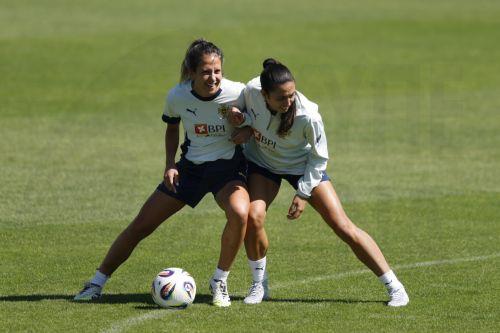 epa12226249 Portuguese players Dolores Silva (L) and Fatima Pinto fight for the ball during a training session held at Stade des Arberes, Meyrin, Switzerland, 09 July 2025. Portugal will play against Belgium in a UEFA Women's EURO 2025 group B match next 11 June in Sion.  EPA/Nuno Veiga