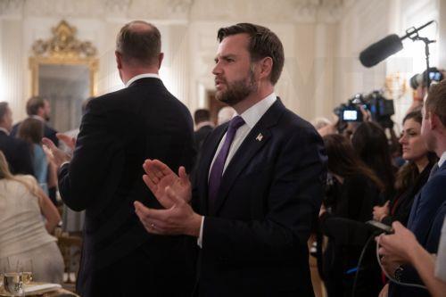 epa12246239 US Vice President JD Vance applauds as President Donald Trump arrives to deliver remarks during a dinner with Republican senators and other guests in the State Dining Room at the White House in Washington, DC, USA, 18 July 2025.  EPA/FRANCIS CHUNG / POOL