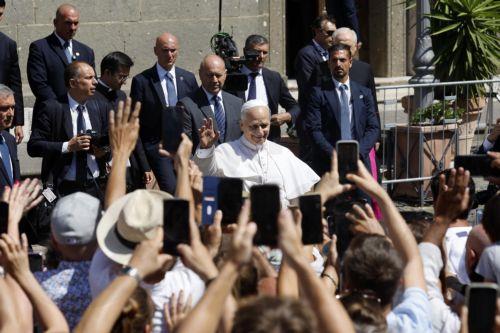 epa12248925 Pope Leo XIV gestures to the faithful as he presides over a holy mass in the Cathedral of St. Pancras in Albano near Rome, Italy, 20 July 2025.  EPA/FABIO FRUSTACI