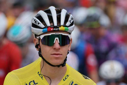 epa12249146 Slovenian rider Tadej Pogacar of UAE Team Emirates stands during the 15th stage of the Tour de France cycling race over 169.3km from Muret to Carcassonne, France, 20 July 2025.  EPA/CHRISTOPHE PETIT TESSON