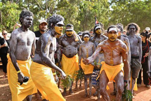 epa12276398 Members of the Gumatj clan of the Yolngu people from north-eastern Arnhem Land arrive to perform the Bunggul traditional dance during the 25th annual Garma Festival in Gulkula, Northern Territory, Australia, 01 August 2025. Garma Festival, Australia's most significant Indigenous cultural gathering, is held each year on Yolŋu Country in northeast...