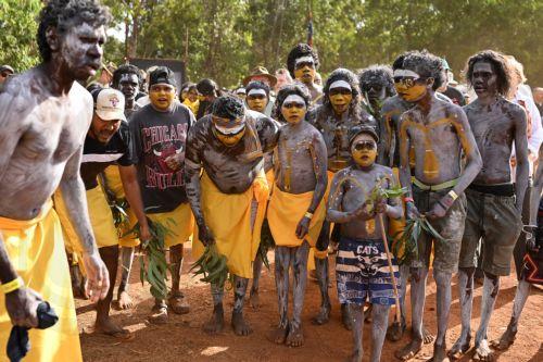 epa12276400 Members of the Gumatj clan of the Yolngu people from north-eastern Arnhem Land arrive to perform the Bunggul traditional dance during the 25th annual Garma Festival in Gulkula, Northern Territory, Australia, 01 August 2025. Garma Festival, Australia's most significant Indigenous cultural gathering, is held each year on Yolŋu Country in northeast...