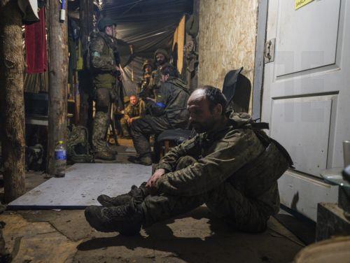 epa12283810 A handout photo made available by the press service of the 93rd 'Kholodnyi Yar' Separate Mechanized Brigade of the Ukrainian Armed Forces on 05 August 2025 shows servicemen from the brigade resting inside a shelter at an undisclosed location near the frontline in the Donetsk region, eastern Ukraine, 04 August 2025, amid the Russian invasion. ...