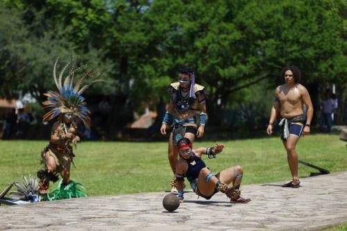 epa12292984 Members of a pre-Hispanic cultural group participate in a re-enactment of a ball game as part of International Day of Indigenous Peoples at the Guachimontones archaeological site in Teuchitlan, Mexico, 10 August 2025. The Purepecha people, originally from the state of Michoacan, faced off against the Tecuexes from Jalisco (western Mexico) in a...