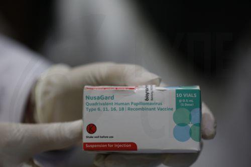epa12311446 A health worker from the Community Health Center prepares a cervical cancer vaccination for Banda Aceh Methodist School students in Banda Aceh, Indonesia, 20 August 2025. Cervical cancer vaccination, including the human papillomavirus vaccine and rubella vaccination, is carried out for school children in specific grades as part of the Indonesian...