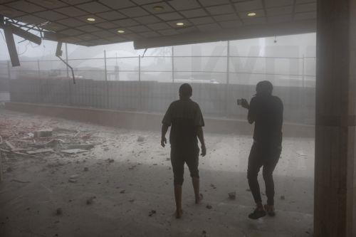 epaselect epa12321389 Palestinians inspect the damage following an Israeli airstrike targeting Nasser Hospital in Khan Younis, southern Gaza Strip, 25 August 2025. According to the Palestinian Health Ministry, the airstrike hit the fourth floor of the Nasser Medical Complex, followed by a second attack upon the arrival of ambulance crews to retrieve the...