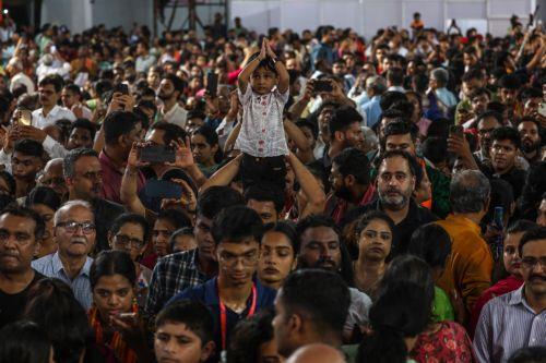 epa12322133 Devotees gathered to take blessings of an idol of Lord Ganesh, adorned with 69+ kilogram of gold ornaments and 336 kilogram of silver at Gowd Saraswat Brahman (G.S.B.) Seva Mandal non-profit organization, during the first look event ahead of Ganesh festival in Mumbai, India, 25 August 2025. The Ganesh Chaturthi festival is a ten-day long event...