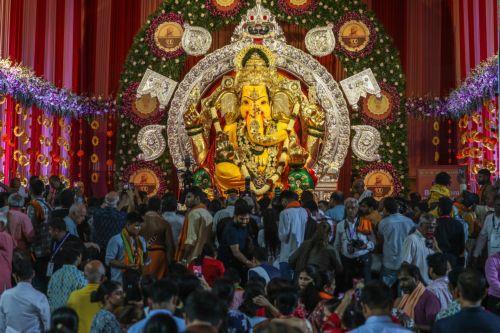 epa12322134 An idol of Lord Ganesh is adorned with 69+ kilogram of gold ornaments and 336 kilogram of silver at Gowd Saraswat Brahman (G.S.B.) Seva Mandal non-profit organization, during the first look event ahead of Ganesh festival in Mumbai, India, 25 August 2025. The Ganesh Chaturthi festival is a ten-day long event which is celebrated all over India....