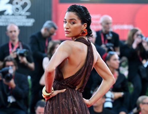 epa12341154 US actor Indya Moore arrives for the screening of 'Father Mother Sister Brother' during the 82nd annual Venice International Film Festival, in Venice, Italy, 31 August 2025. The film festival runs from 27 August to 06 September 2025.  EPA/ETTORE FERRARI