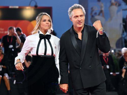 epa12341364 Italian journalist Francesca Barra (L) and Italian actor Claudio Santamaria (R) attend the 'Filming Italy Venice Awards' during the 82nd annual Venice International Film Festival, in Venice, Italy, 31 August 2025. The film festival runs from 27 August to 06 September 2025.  EPA/ETTORE FERRARI