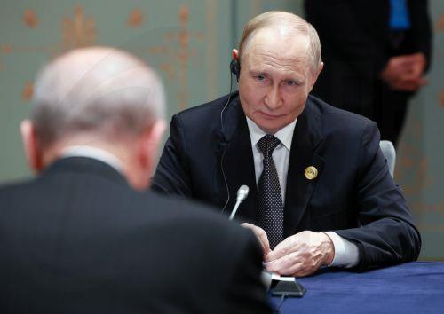 epa12342212 Russian President Vladimir Putin (R) attends a bilateral meeting with Turkish President Recep Tayyip Erdogan on the sidelines of the Shanghai Cooperation Organisation (SCO) summit in Tianjin, China, 01 September 2025.  EPA/VLADIMIR SMIRNOV / SPUTNIK/KREMLIN POOL MANDATORY CREDIT