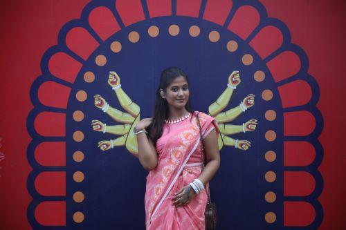 epa12414610 A devotee visits a makeshift Puja pandal and rituals during the four-day Durga Puja festival in Dhaka, Bangladesh, 29 September 2025. The Durga Puja 2025 will take place in Bangladesh from 29 September to 02 October. The festival celebrates goddess Durga as the motherly power behind creation, as well as her victory over the demon Mahishasura. ...