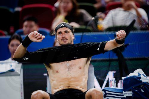 epa12434720 Alexander Zverev of Germany reacts during his Men's Singles match against Arthur Rinderknech of France at the Shanghai Masters tennis tournament in Shanghai, China, 06 October 2025.  EPA/ALEX PLAVEVSKI