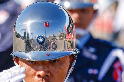 epaselect epa12443726 A Taiwanese honor guard salutes as he take part in a parade during Taiwan's National Day celebrations outside the Presidential Palace in Taipei, Taiwan, 10 October 2025.
Taiwan's National day, also known as Double Ten Day, is celebrated annually on 10 October.  EPA/RITCHIE B. TONGO