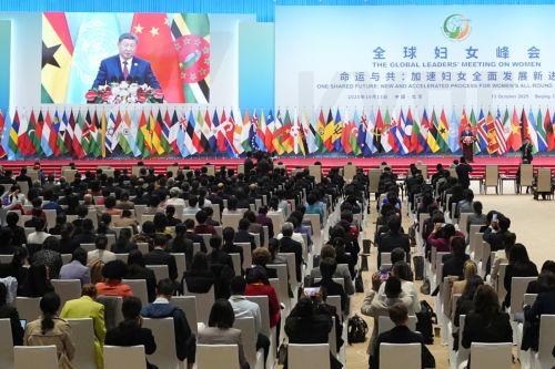 epa12449758 A general view of the opening ceremony of the Global Women’s Summit 2025 as China’s President Xi Jinping delivers a speech at China National Convention Center in Beijing, China, 13 October 2025.  EPA/KEN ISHII / POOL