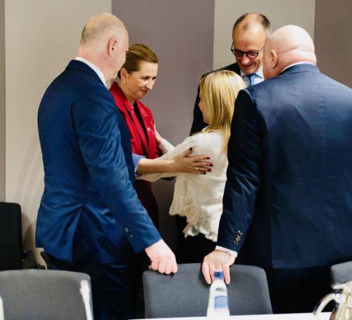 epa12475449 A handout photo made available by Palazzo Chigi Press Office, shows Italian Prime Minister Giorgia Meloni (C) , together with the Danish Prime Minister Mette Frederiksen (2-L) and German Chancellor Friedrich Merz (2-R) at the Europa Building to participate in the European Council, in Brussels, Belgium, 23 October 2025.  EPA/Filippo Attili /...