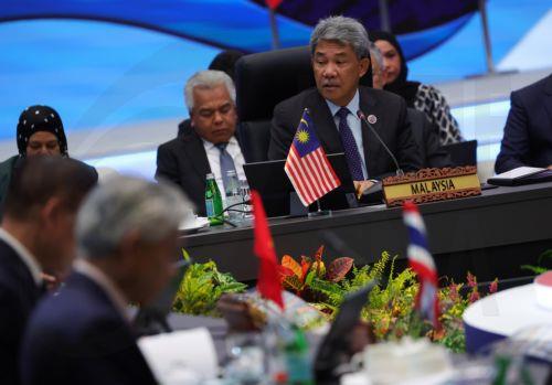 epa12480005 Malaysia’s Minister of Foreign Affairs Mohamad Hasan (R) speaks during the ASEAN Foreign Ministers’ Meeting ahead of the Association of Southeast Asian Nations (ASEAN) Summit at the Kuala Lumpur Convention Centre (KLCC), in Kuala Lumpur, Malaysia, 25 October 2025. The 47th Asean Summit and Related Summits is scheduled to take place in Kuala...