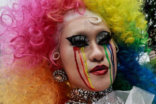 epa12480507 A person participates in the annual Taiwan Pride parade in Taipei, Taiwan, 25 October 2025. This year's theme, 'Beyond Links: More Than Clicks', examines online conversations about gender and the challenges LGBTQ+ individuals face in the digital age.  EPA/RITCHIE B. TONGO