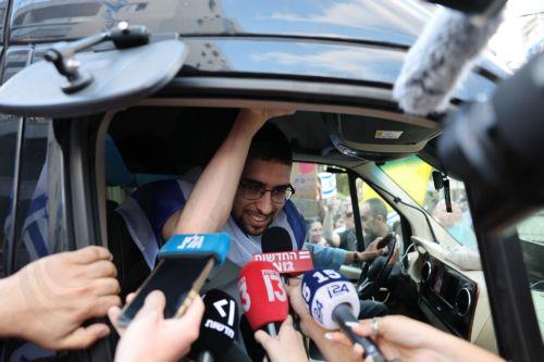 epa12483935 Released Israeli hostage Evyatar David waves to crowds as he returns to his home after completing hospitalization and treatment period, in Kfar Sava, Israel, 26 October 2025. Evyatar David was kidnapped by Hamas from the Nova music festival at the Gaza border 07 October 2023 and released during a ceasefire agreement between Hamas and Israel. The...