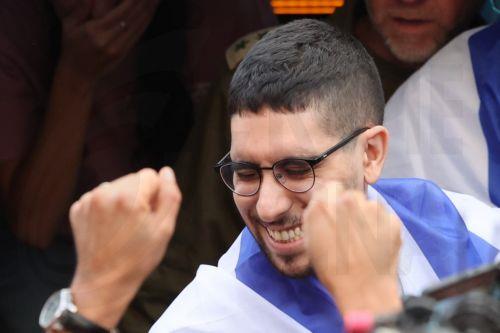 epa12483941 Released Israeli hostage Evyatar David waves to crowds as he returns to his home after completing hospitalization and treatment period, in Kfar Sava, Israel, 26 October 2025. Evyatar David was kidnapped by Hamas from the Nova music festival at the Gaza border 07 October 2023 and released during a ceasefire agreement between Hamas and Israel. The...