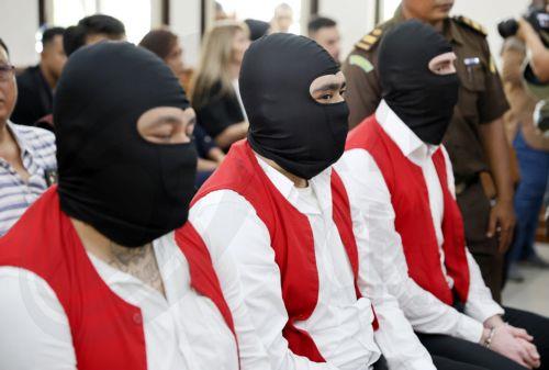 epa12500038 (L-R) Australian citizen Tupou Pasa Midolmore, Coskun Mevlut and Darcy Francesco Jenson attend their trial at the  Denpasar District Court escorted by police officers in Denpasar, Bali, Indonesia, 03 November 2025. Three Australian citizens are on trial in connection with the 14 June 2025 shooting of two Australians, Zivan Radmanovic, who was...