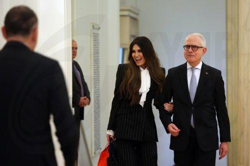 epa12502390 Greek Foreign Minister Giorgos Gerapetritis (L) welcomes new US Ambassador to Greece Kimberly Guilfoyle (C) at the Ministry of Foreign Affairs in Athens, Greece, 04 November 2025, following the presentation of her credentials to the Greek president.  EPA/ORESTIS PANAGIOTOU