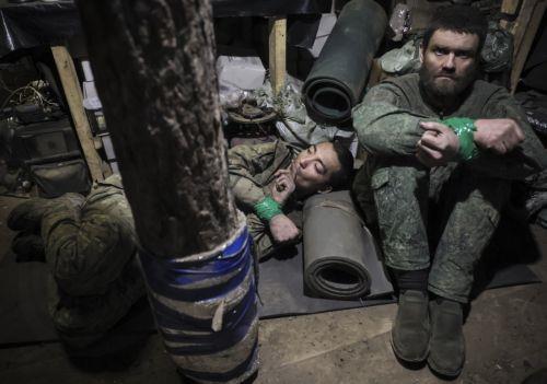 epa12502400 A handout photo made available by the press service of the 24th Mechanized Brigade of Ukrainian Armed Forces 04 November 2025 shows Russian prisoners of war captured by the servicemen of the 24th Mechanized Brigade named after King Danylo, not far from the frontline positions near Chasiv Yar, Ukraine, 28 October 2025, amid the ongoing Russian...