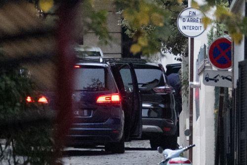 epa12516340 Former French President Nicolas Sarkozy (R) arrives by car at his house after leaving La Sante prison following a court decision to release him, in Paris, France, 10 November 2025. A French appeals court approved a request for an early release of Sarkozy, who was sentenced to five years in jail for his role in the case involving funds from...