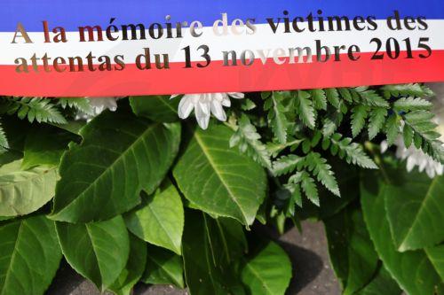 epa12522569 A wreath from the Mayors' Association is laid outside the Stade de France stadium prior to a ceremony in tribute to victims of the November 2015 Paris attacks, in Saint-Denis northern suburb of Paris, France, 13 November 2025. Ten years ago 130 people were killed, and hundreds were injured in a series of coordinated terrorist attacks that...