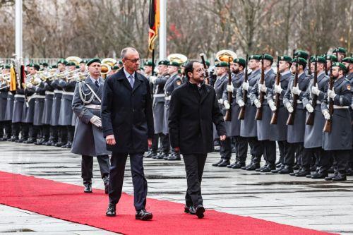 epaselect epa12525690 German Chancellor Friedrich Merz (L) welcomes the Cypriot President Nikos Christodoulides (R) with military honours, at the Federal Chancellery of Germany in Berlin, Germany, 14 November 2025. Christodoulides' visit aims to present to Merz the main pillars of Cyprus's EU presidency program, including EU defense, border management, and...