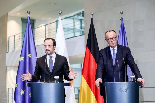 epa12525985 German Chancellor Friedrich Merz (R) and Cypriot President Nikos Christodoulides (L) attend a press conference at the Federal Chancellery in Berlin, Germany, 14 November 2025. Christodoulides' visit aims to present to Merz the main pillars of Cyprus's EU presidency program, including EU defense, border management, and support for EU enlargement,...