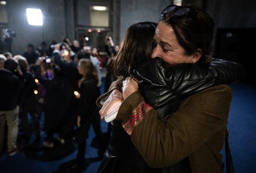 epa12534742 People react and celebrate at the Rayburn House Office Building after news broke that the Senate unanimously approved to pass the house bill in Washington, DC, USA, 18 November 2025. The Democratic Women’s Caucus held a vigil in honor of the Jeffrey Epstein abuse survivors in the Rayburn House Office Building foyer. The House voted on a bill,...