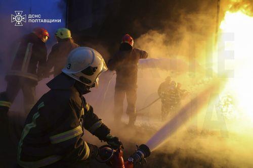 epa12576516 A handout photo made available by the State Emergency Service shows Ukrainian rescuers working at the site of the overnight Russian missile and drone strikes in the Poltava region of Ukraine, 07 December 2025, amid the ongoing Russian invasion. According to Mayor Vitaliy Maletskyi, there were power, heat, and water outages in Kremenchuk city due...