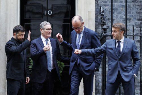 epa12578776 (L-R) Ukraine's President Volodymyr Zelensky, British Prime Minister Keir Starmer, German Chancellor Friedrich Merz and French President Emmanuel Macron speak to each other as they depart from 10 Downing Street, London, Britain, 08 December 2025. The President of Ukraine is visiting Downing Street to meet the leaders of the UK, France, and...