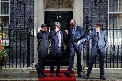 epa12578777 (L-R) Ukraine's President Volodymyr Zelensky, British Prime Minister Keir Starmer, German Chancellor Friedrich Merz and French President Emmanuel Macron speak to each other as they depart from 10 Downing Street, London, Britain, 08 December 2025. The President of Ukraine is visiting Downing Street to meet the leaders of the UK, France, and...
